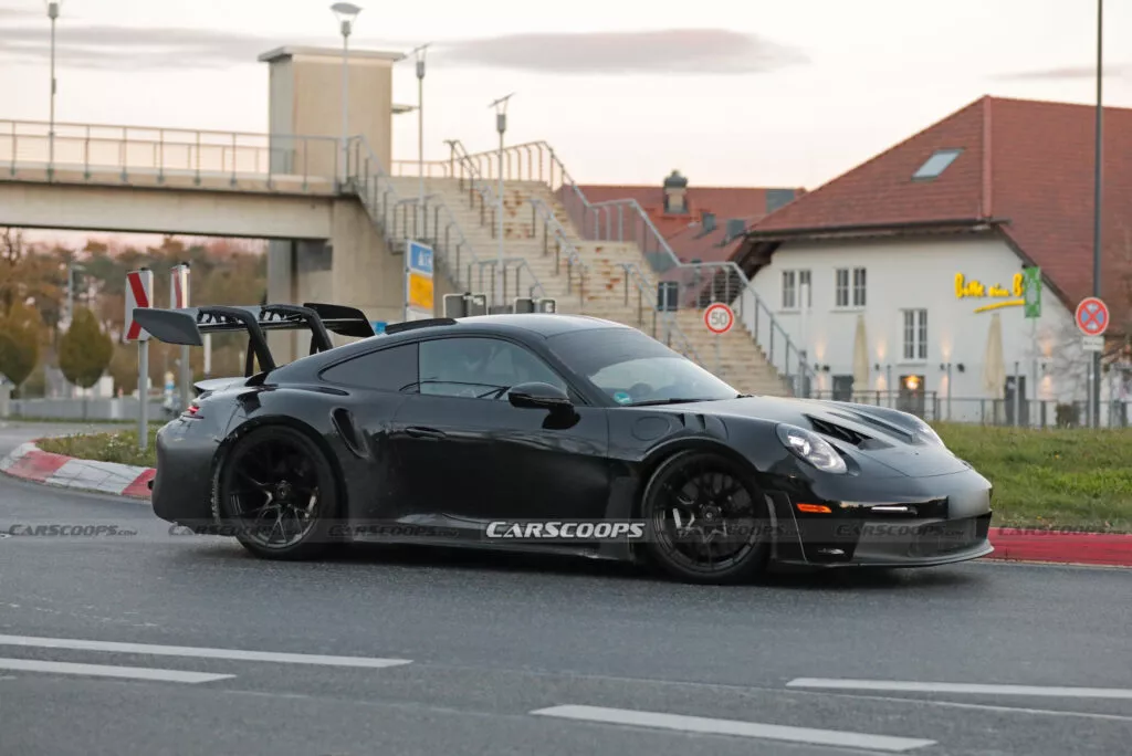 https://www.carscoops.com/wp-content/uploads/webp/2024/11/Porsche-911-GT3-RS-spy-shots-00019-1024x684.webp