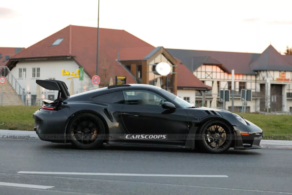 https://www.carscoops.com/wp-content/uploads/webp/2024/11/Porsche-911-GT3-RS-spy-shots-00020-1024x684.webp