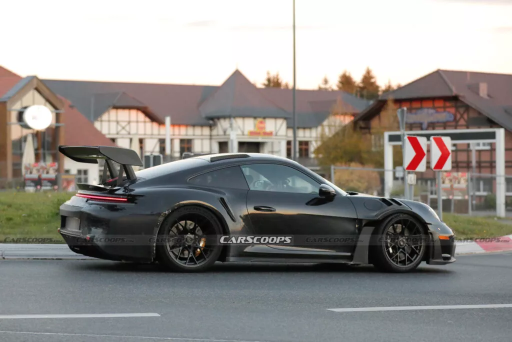 https://www.carscoops.com/wp-content/uploads/webp/2024/11/Porsche-911-GT3-RS-spy-shots-00021-1024x684.webp