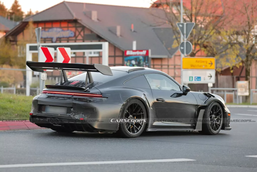 https://www.carscoops.com/wp-content/uploads/webp/2024/11/Porsche-911-GT3-RS-spy-shots-00022-1024x684.webp