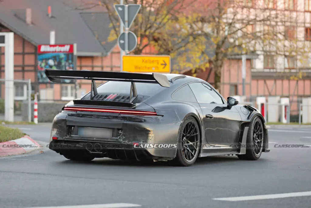 https://www.carscoops.com/wp-content/uploads/webp/2024/11/Porsche-911-GT3-RS-spy-shots-00023-1024x684.webp