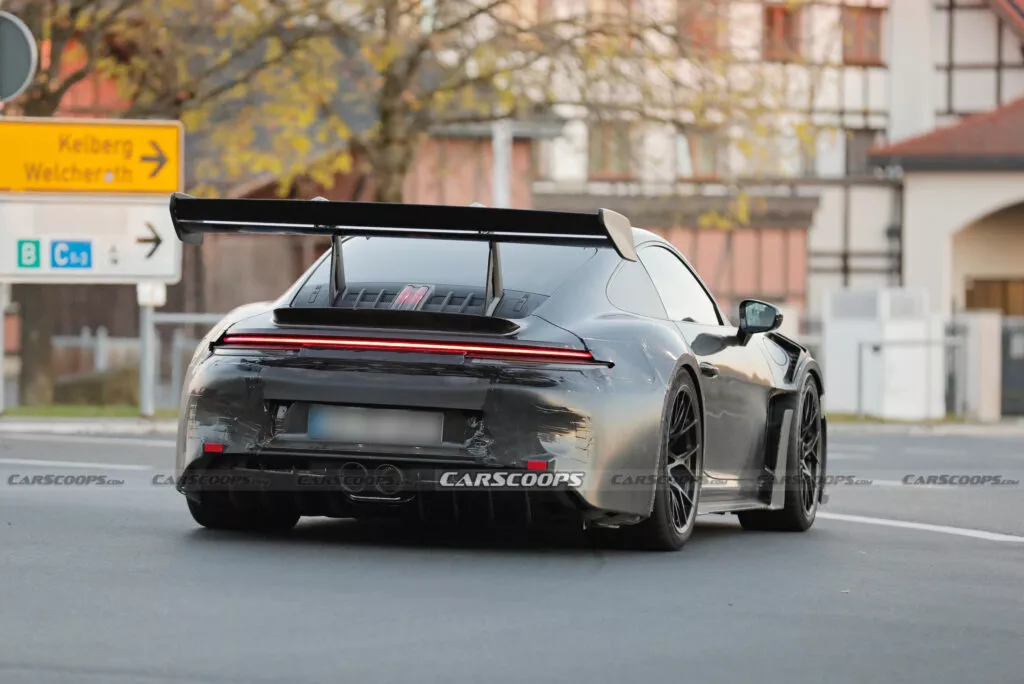 https://www.carscoops.com/wp-content/uploads/webp/2024/11/Porsche-911-GT3-RS-spy-shots-00024-1024x684.webp