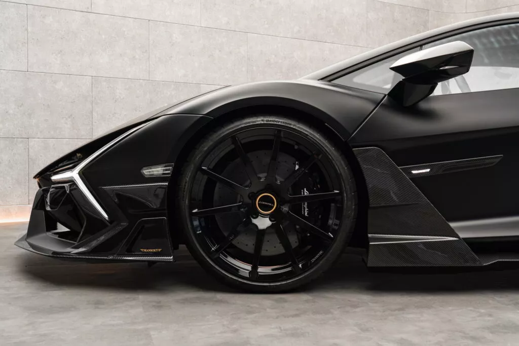 https://www.carscoops.com/wp-content/uploads/webp/2024/12/Lamborghini_Revuelto_by_MANSORY-13-1024x683.webp