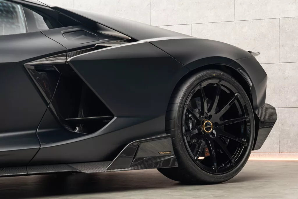 https://www.carscoops.com/wp-content/uploads/webp/2024/12/Lamborghini_Revuelto_by_MANSORY-17-1024x683.webp
