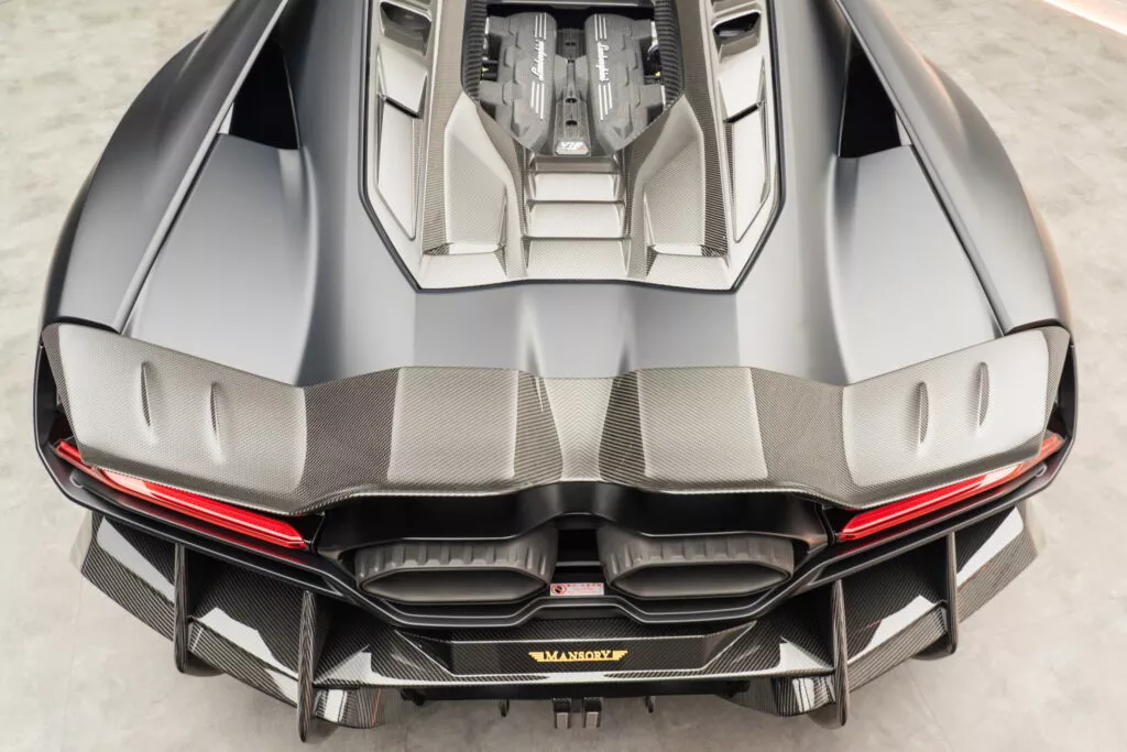 https://www.carscoops.com/wp-content/uploads/webp/2024/12/Lamborghini_Revuelto_by_MANSORY-18-1024x683.webp