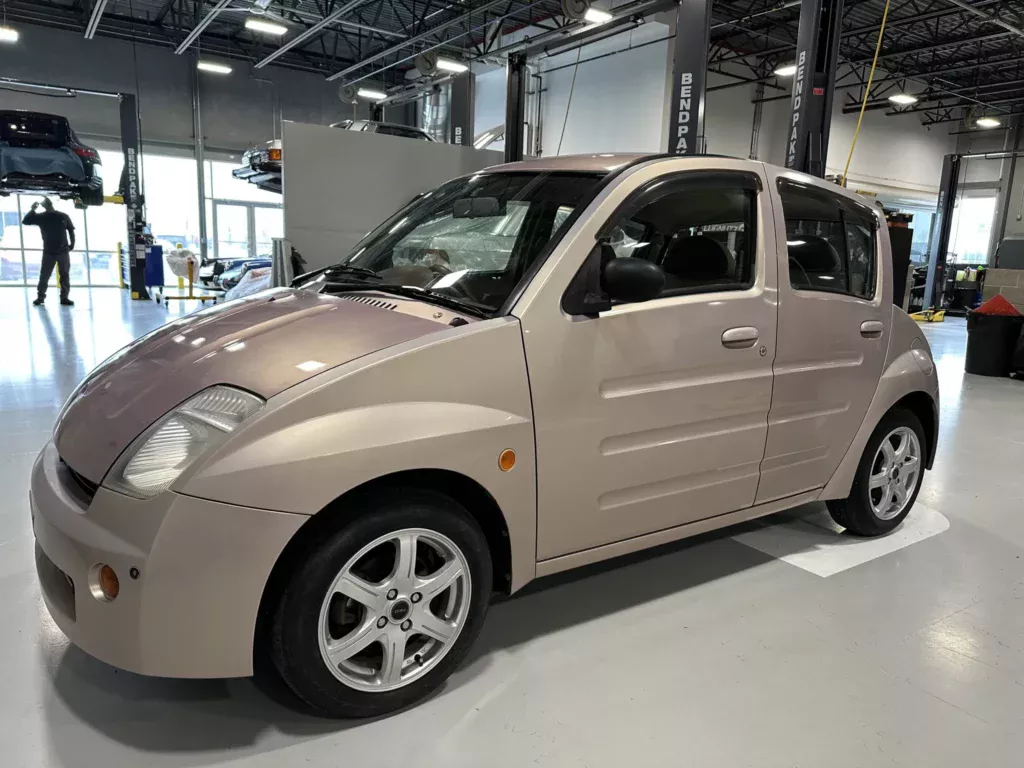 https://www.carscoops.com/wp-content/uploads/webp/2025/03/Toyota-WiLL-Vi-1-1024x768.webp