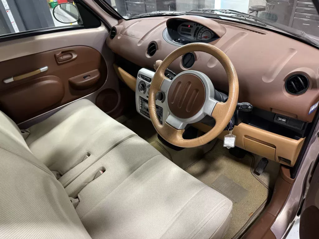 https://www.carscoops.com/wp-content/uploads/webp/2025/03/Toyota-WiLL-Vi-14-1024x768.webp