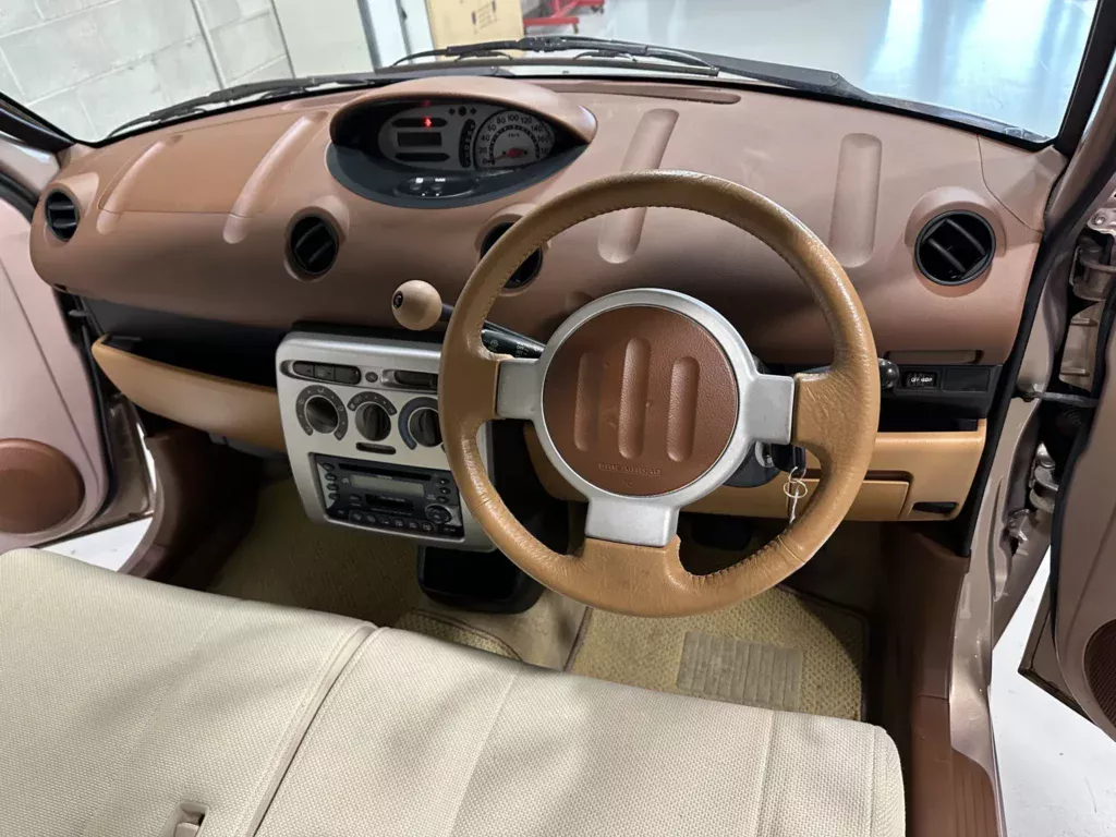 https://www.carscoops.com/wp-content/uploads/webp/2025/03/Toyota-WiLL-Vi-16-1024x768.webp
