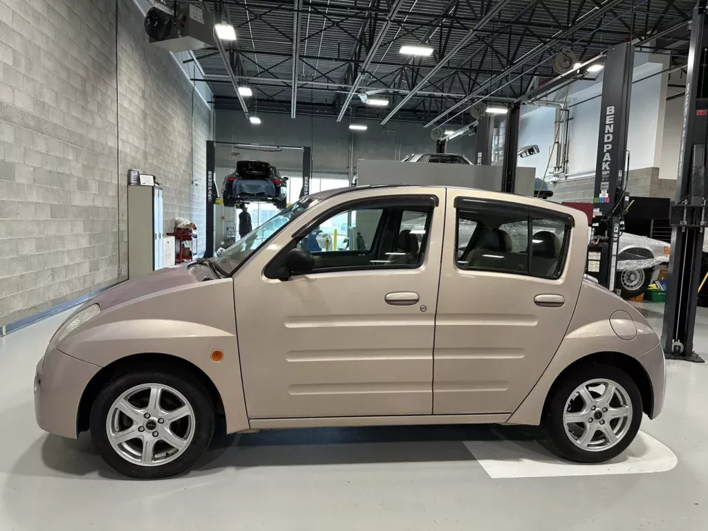 https://www.carscoops.com/wp-content/uploads/webp/2025/03/Toyota-WiLL-Vi-2-1024x768.webp