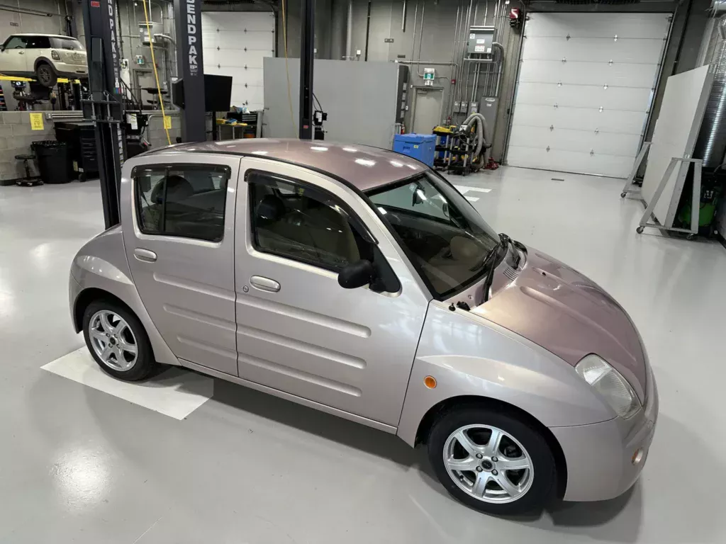 https://www.carscoops.com/wp-content/uploads/webp/2025/03/Toyota-WiLL-Vi-7-1024x768.webp
