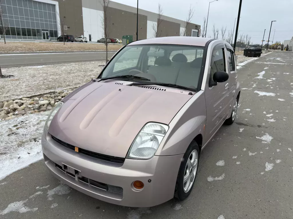 https://www.carscoops.com/wp-content/uploads/webp/2025/03/Toyota-WiLL-Vi-9-1024x768.webp