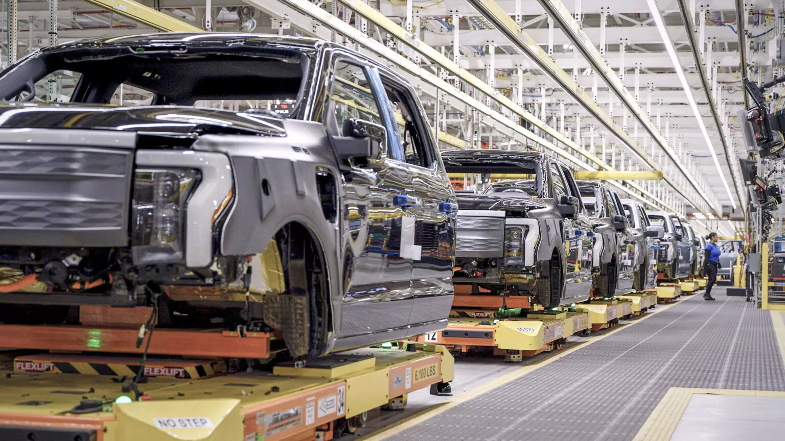 https://www.carscoops.com/wp-content/uploads/webp/2025/05/2023-Ford-F-150-Lightning-Production-2-1536x864.webp