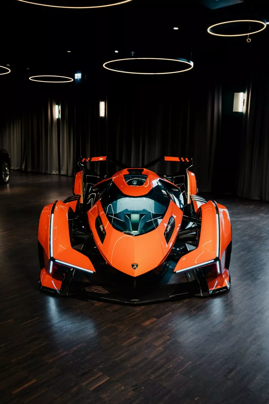 https://www.carscoops.com/wp-content/uploads/webp/2025/05/Lamborghini-Vision-GT-Orange-3-1024x1536.webp