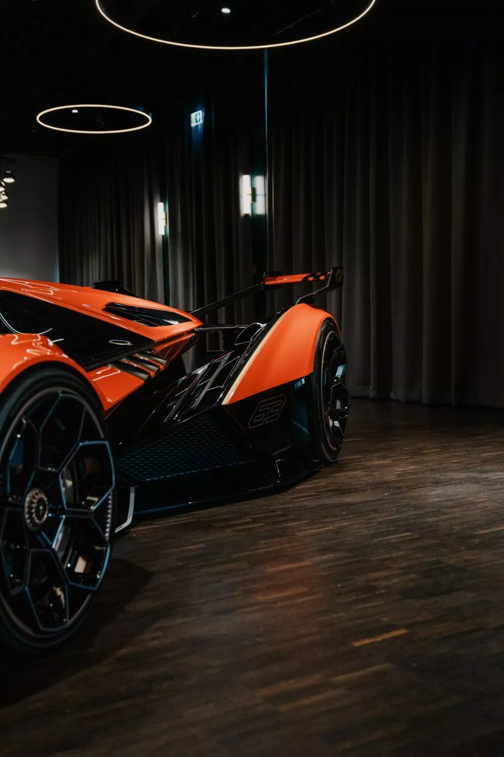 https://www.carscoops.com/wp-content/uploads/webp/2025/05/Lamborghini-Vision-GT-Orange-6-1024x1536.webp