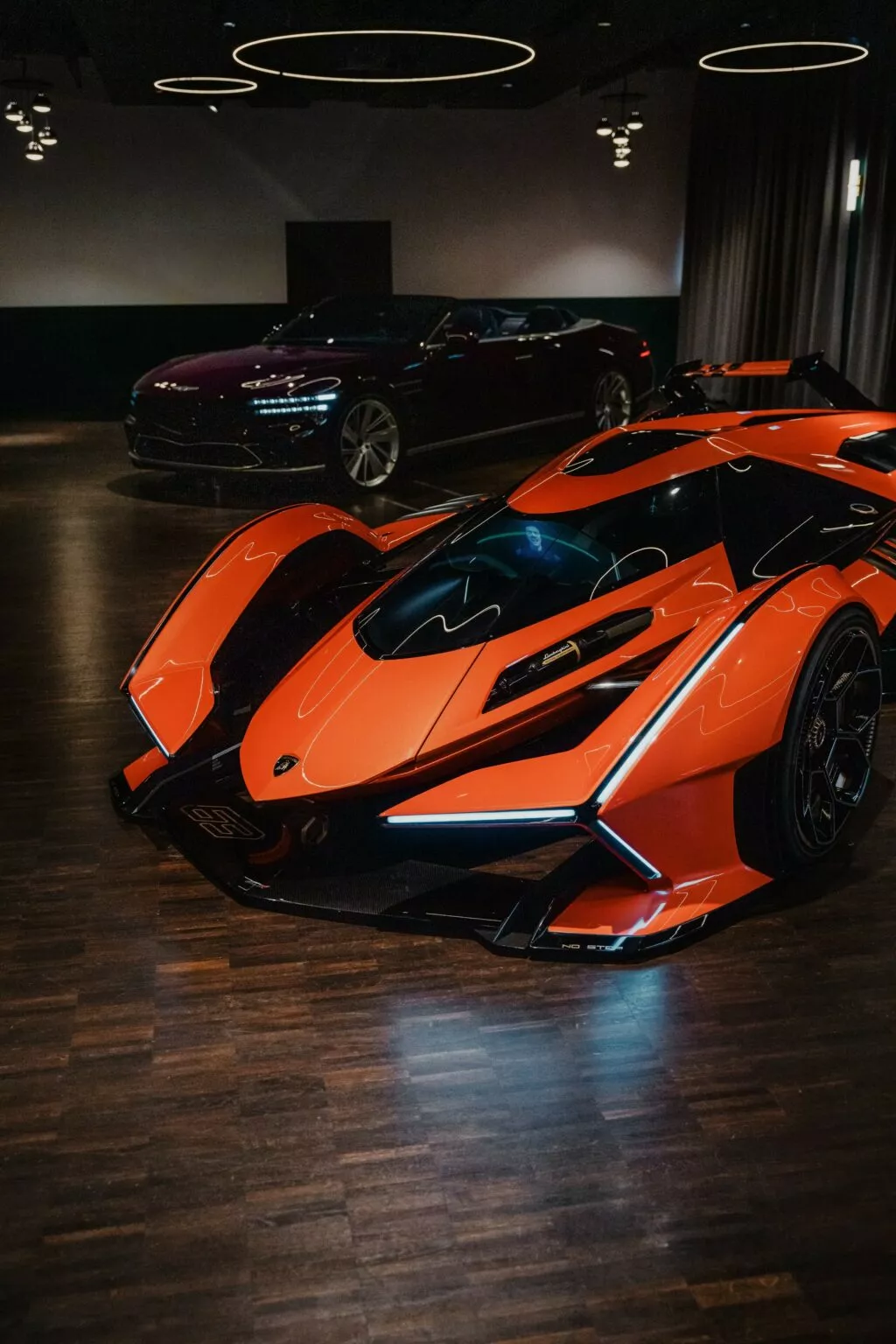 https://www.carscoops.com/wp-content/uploads/webp/2025/05/Lamborghini-Vision-GT-Orange-7-1024x1536.webp