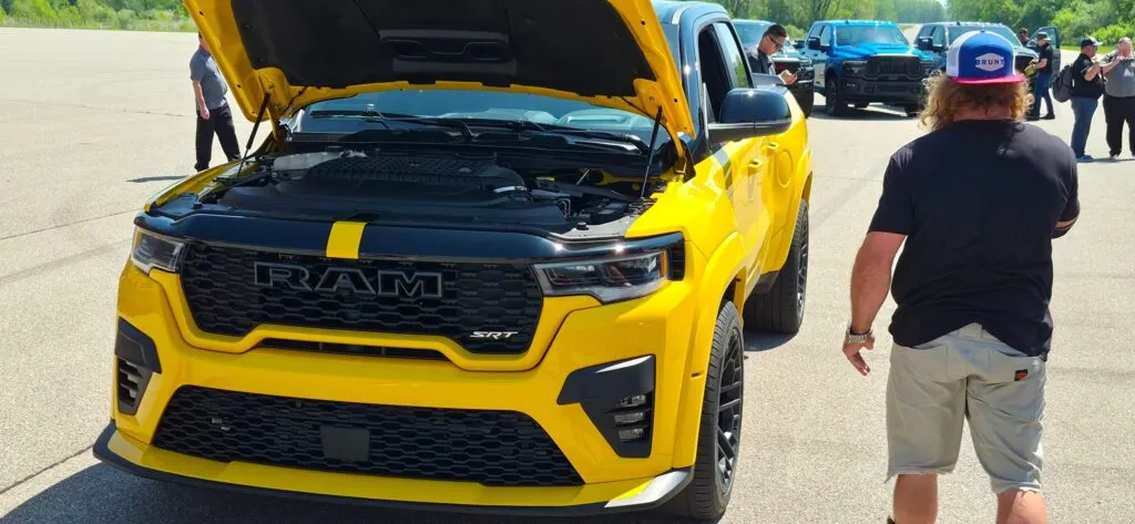 https://www.carscoops.com/wp-content/uploads/webp/2026/05/2027-Ram-1500-Rumble-Bee-SRT-Gauthier-Carscoops-519-17-1024x473.webp