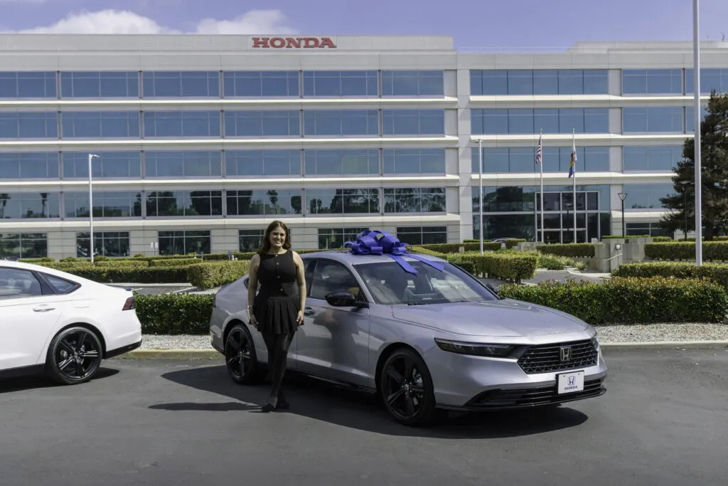 https://www.carscoops.com/wp-content/uploads/webp/2026/06/03-Alondra-with-her-2026-Honda-Accord-Hybrid-the-15000001st-Accord-sold-in-America-1024x683.webp