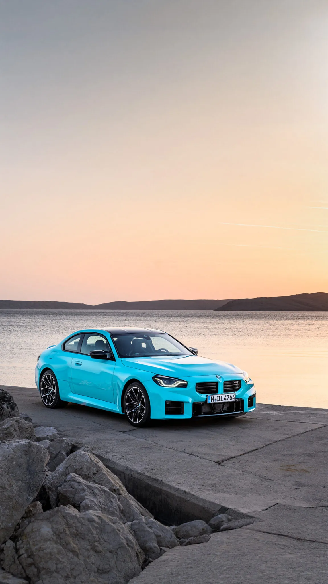 https://www.carscoops.com/wp-content/uploads/webp/2026/06/BMW-M2-xDrive-202733-1152x2048.webp