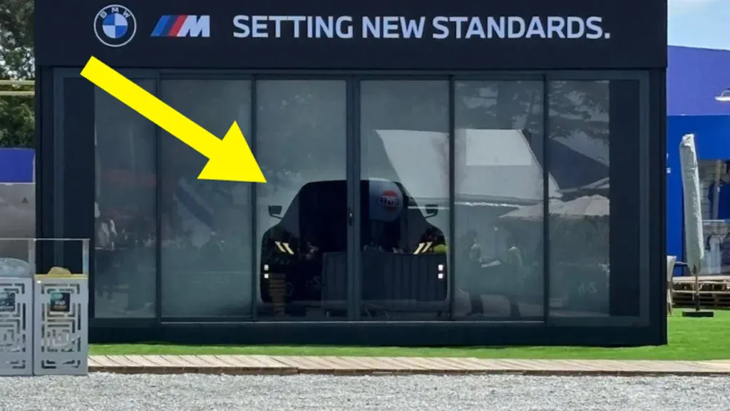 https://www.carscoops.com/wp-content/uploads/webp/2026/06/BMW-iM3-Leak-Le-Mans-1-1024x577.webp