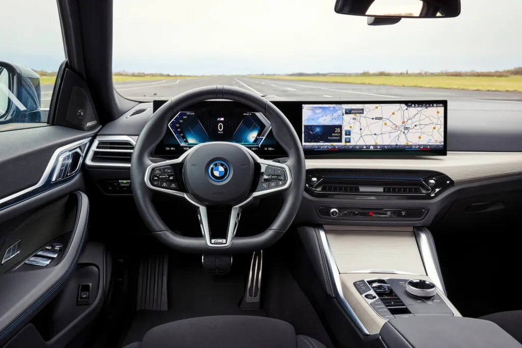 https://www.carscoops.com/wp-content/uploads/webp/2026/06/P90546686_highRes_the-new-bmw-i4-e-dri-1024x683.webp